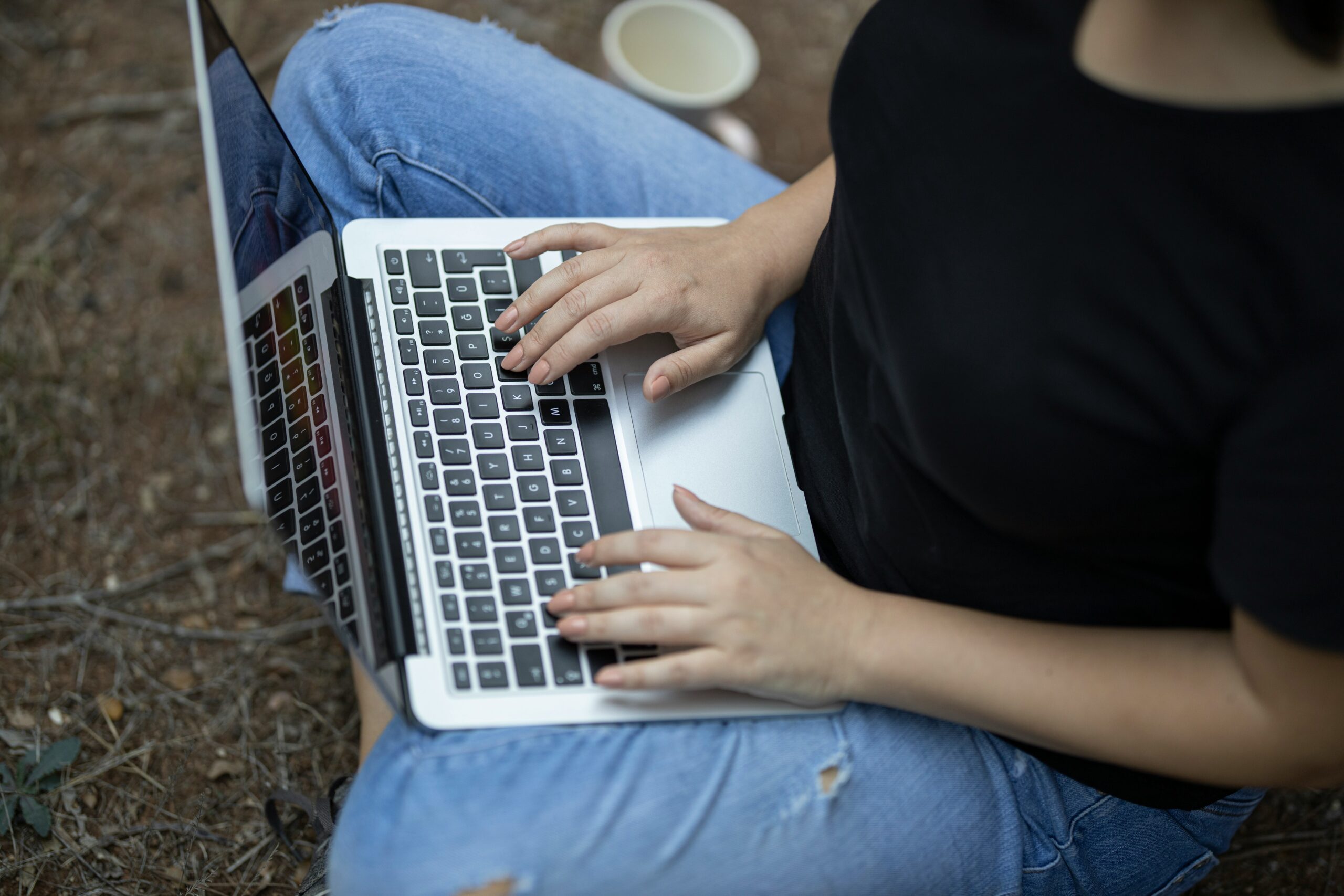 Person with laptop in their lap